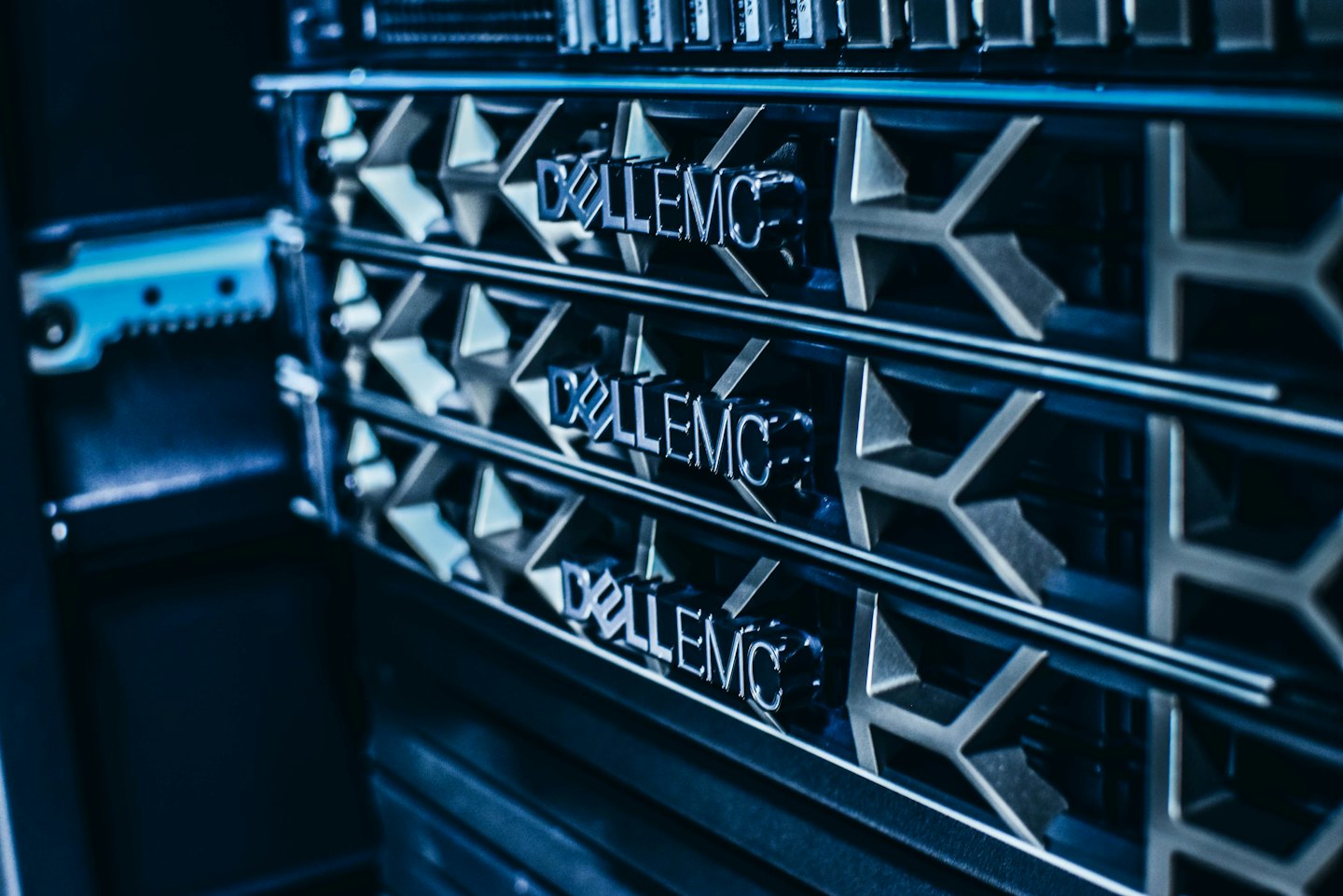 Server rack units with DELLEMC logos stacked in a data center.